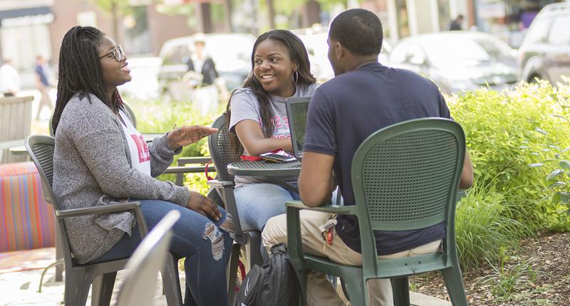 students hanging out in UpTown Normal